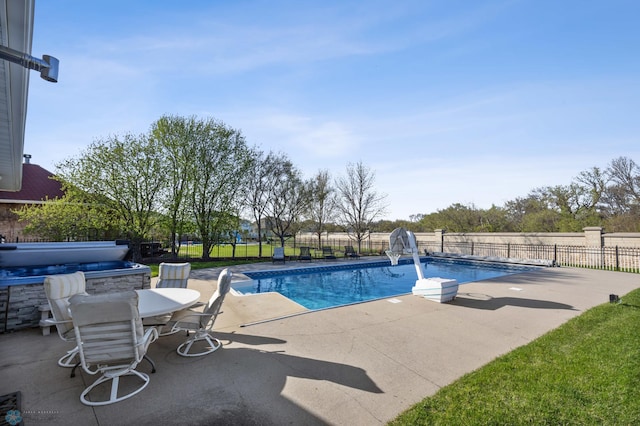 4126 Timberline Dr S, Fargo, ND 58104 - view of swimming pool featuring a patio area and fence
