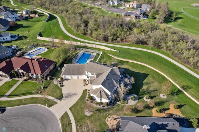 4126 Timberline Dr S, Fargo, ND 58104 - aerial overview of property's location with a pool and nearby suburban area