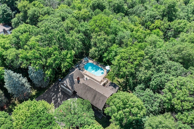 12576 Ridgewood Dr NW, Elk River, MN 55330 - bird's eye view of a pool area and a forest