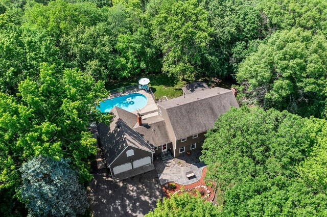 12576 Ridgewood Dr NW, Elk River, MN 55330 - aerial view of property and surrounding area featuring a pool and a heavily wooded area