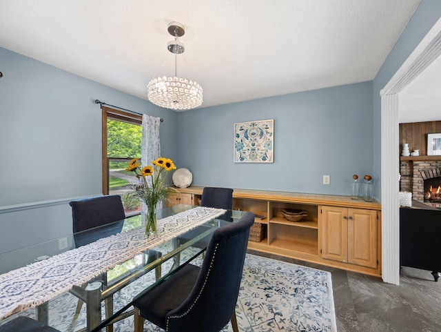 12576 Ridgewood Dr NW, Elk River, MN 55330 - dining area featuring a chandelier