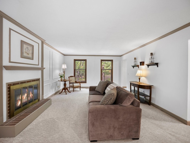 12576 Ridgewood Dr NW, Elk River, MN 55330 - living area featuring crown molding, light carpet, a glass covered fireplace, and baseboards
