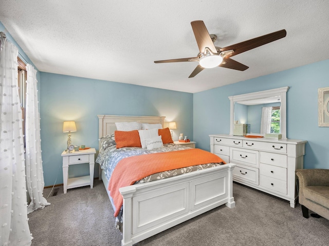 12576 Ridgewood Dr NW, Elk River, MN 55330 - bedroom featuring carpet floors, a textured ceiling, and a ceiling fan