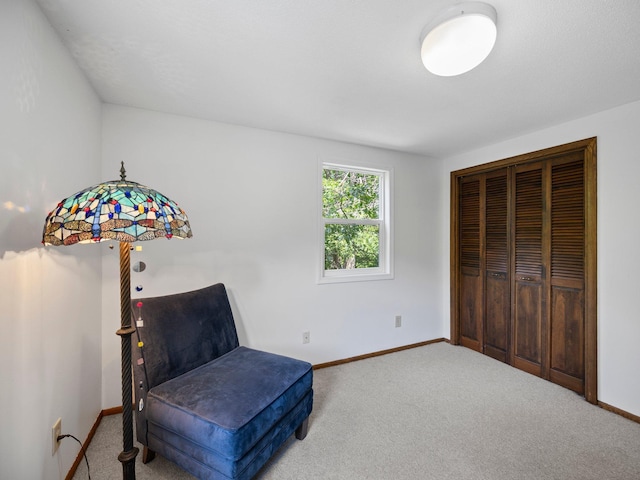 12576 Ridgewood Dr NW, Elk River, MN 55330 - sitting room featuring carpet flooring and baseboards