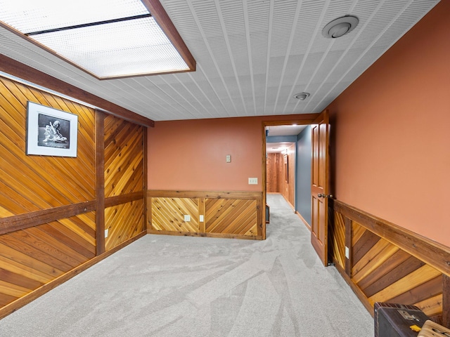 12576 Ridgewood Dr NW, Elk River, MN 55330 - corridor with wooden walls and carpet flooring