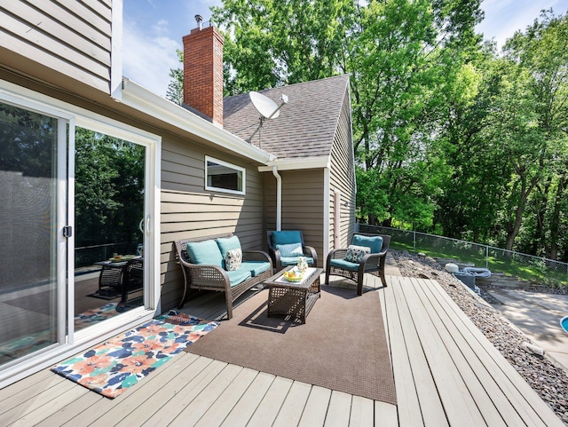 12576 Ridgewood Dr NW, Elk River, MN 55330 - wooden terrace featuring an outdoor living space