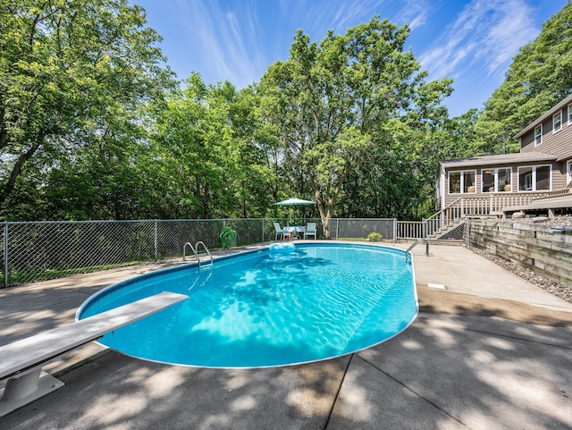 12576 Ridgewood Dr NW, Elk River, MN 55330 - view of pool featuring stairway, view of scattered trees, and a patio