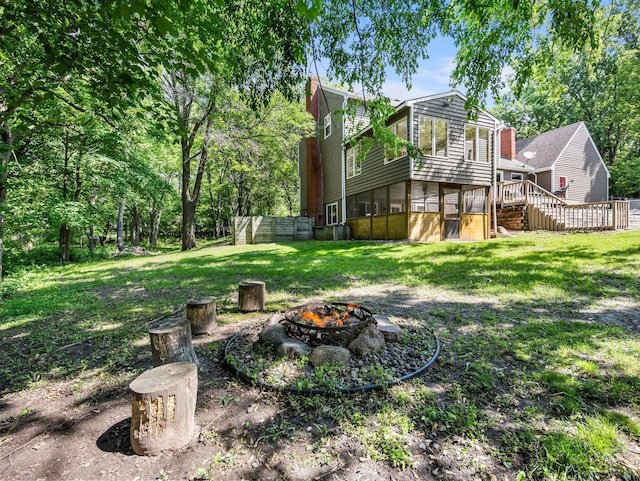 12576 Ridgewood Dr NW, Elk River, MN 55330 - view of yard with a fire pit and stairs