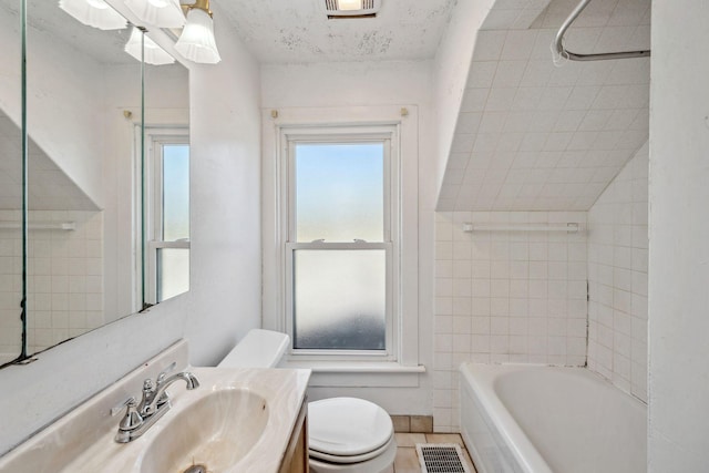 full bathroom featuring toilet and vanity