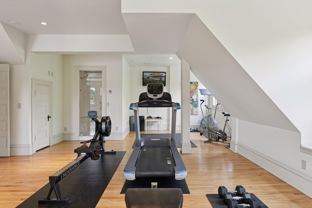 1721 Mount Curve Ave, Minneapolis, MN 55403 - workout area with light wood-type flooring, recessed lighting, and baseboards