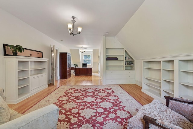 1721 Mount Curve Ave, Minneapolis, MN 55403 - living area with a chandelier and light wood-style floors