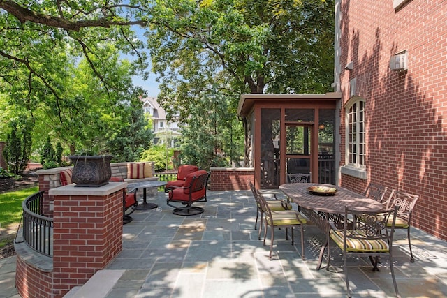 1721 Mount Curve Ave, Minneapolis, MN 55403 - view of patio / terrace with a sunroom and outdoor dining area