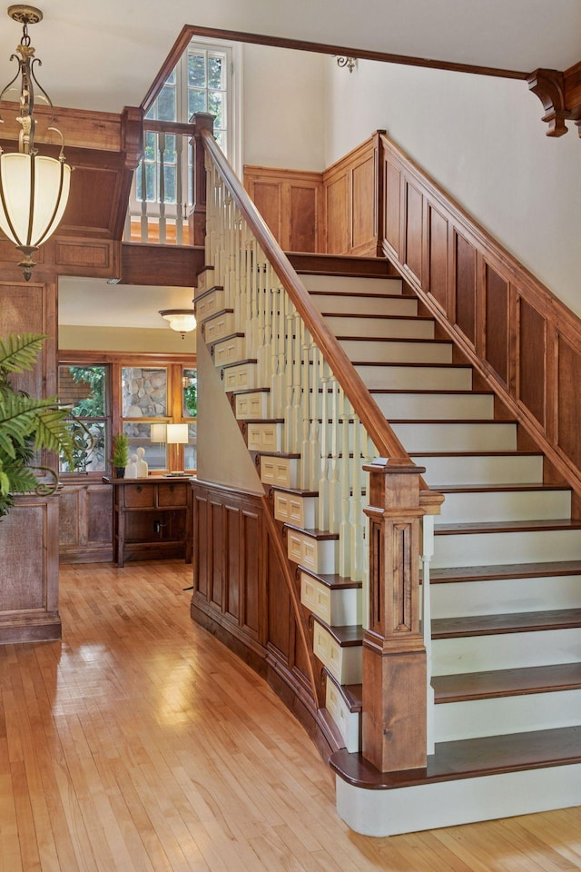 1721 Mount Curve Ave, Minneapolis, MN 55403 - staircase with hardwood / wood-style flooring