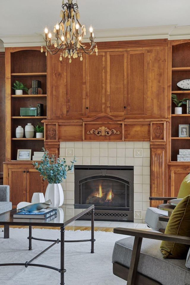 1721 Mount Curve Ave, Minneapolis, MN 55403 - living area featuring a tiled fireplace, a chandelier, and built in features