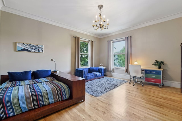 1721 Mount Curve Ave, Minneapolis, MN 55403 - bedroom with a chandelier, wood finished floors, crown molding, and baseboards