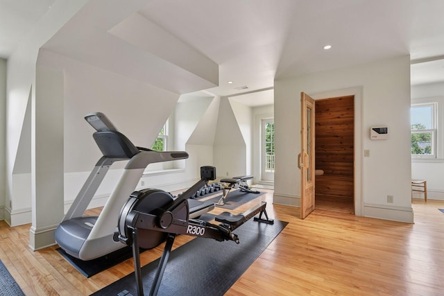 1721 Mount Curve Ave, Minneapolis, MN 55403 - workout area featuring wood finished floors, plenty of natural light, recessed lighting, and baseboards