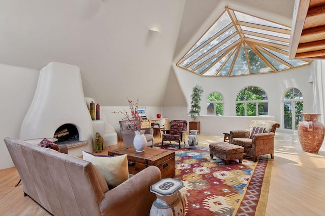 1721 Mount Curve Ave, Minneapolis, MN 55403 - living room featuring vaulted ceiling and wood finished floors