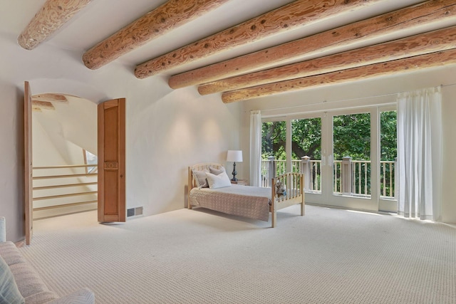 1721 Mount Curve Ave, Minneapolis, MN 55403 - carpeted bedroom featuring access to exterior and beam ceiling
