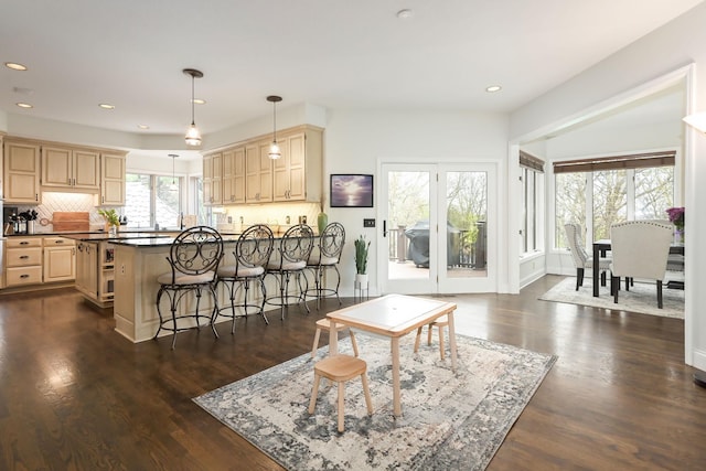 living room featuring recessed lighting and dark wood-type flooring