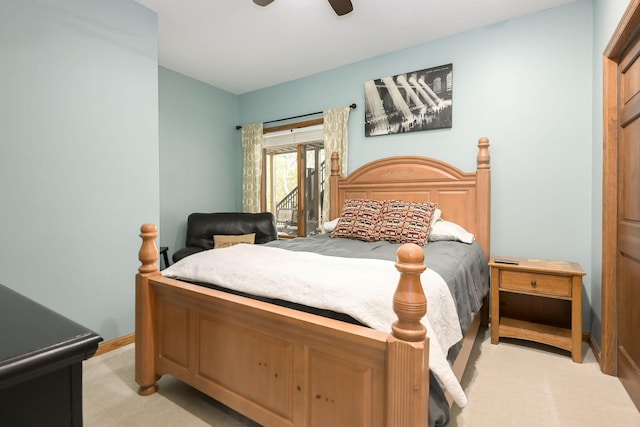 bedroom with light colored carpet, baseboards, ceiling fan, and access to exterior