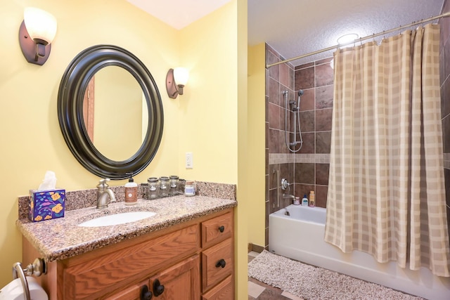 full bathroom featuring shower / bath combo and vanity