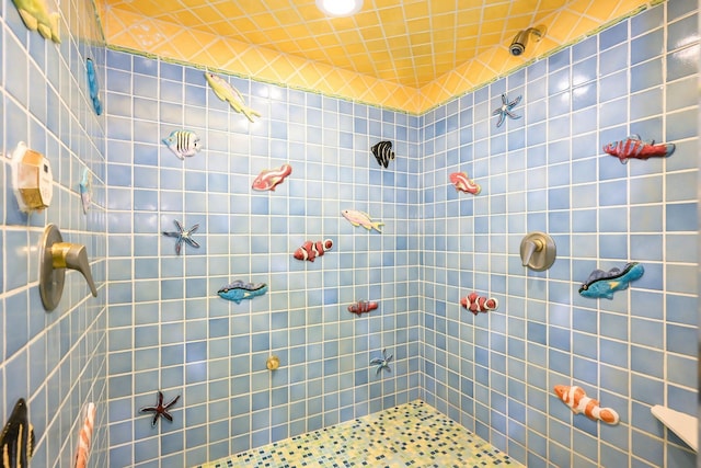 full bathroom with a tile shower