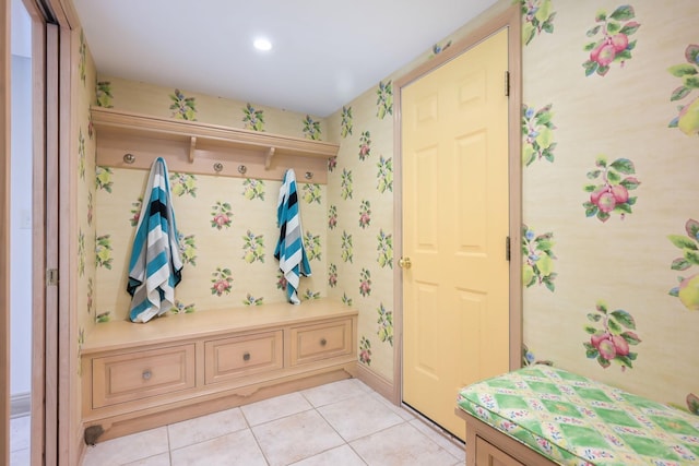 mudroom featuring wallpapered walls, light tile patterned floors, baseboards, and recessed lighting