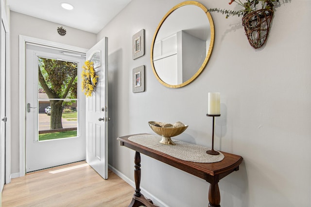entrance foyer with light wood-type flooring, baseboards, and recessed lighting