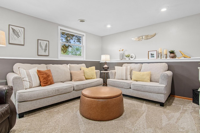 carpeted living area featuring recessed lighting