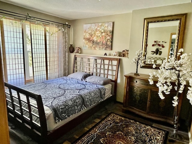 bedroom featuring a textured ceiling