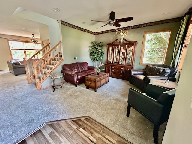 7263 Falmouth Curv, Shakopee, MN 55379 - living area featuring ceiling fan, carpet, stairway, and wood finished floors