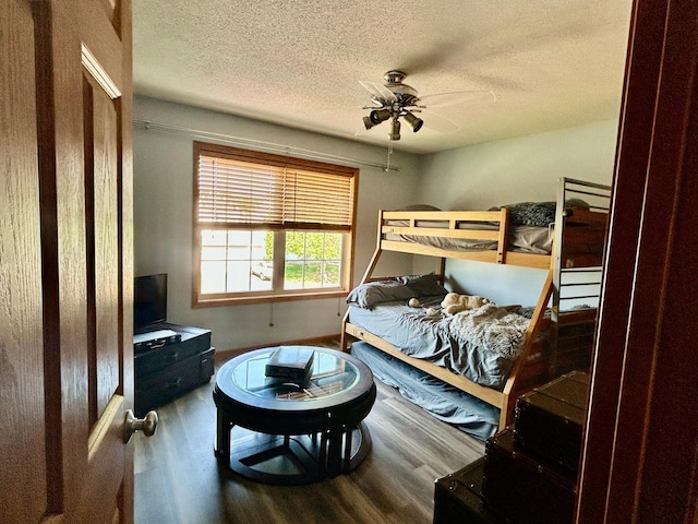 7263 Falmouth Curv, Shakopee, MN 55379 - bedroom featuring wood finished floors, a textured ceiling, and a ceiling fan
