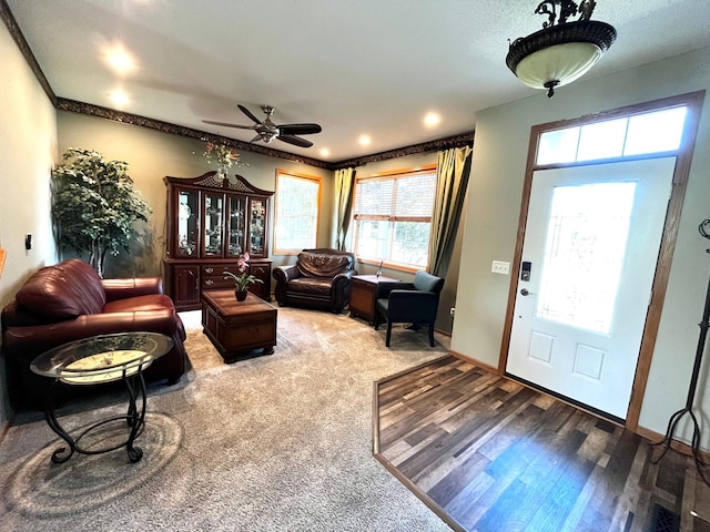 7263 Falmouth Curv, Shakopee, MN 55379 - living room with ceiling fan, baseboards, wood finished floors, and crown molding