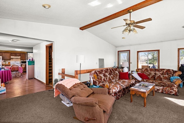 carpeted living area featuring ceiling fan