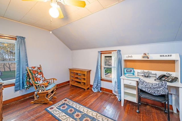 office space with hardwood / wood-style floors, baseboards, vaulted ceiling, and healthy amount of natural light