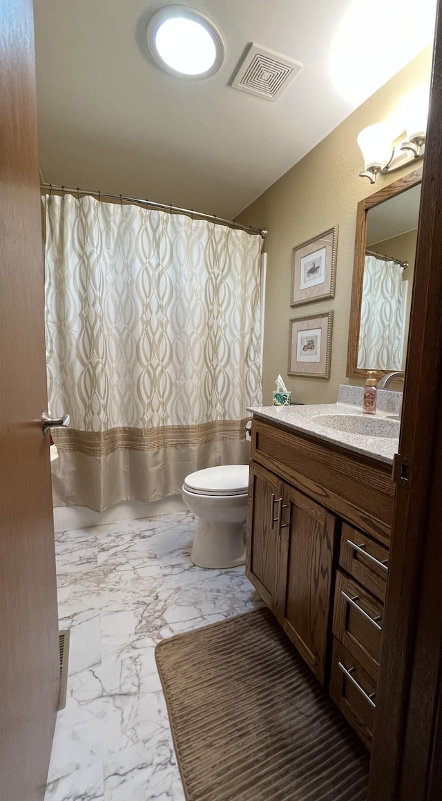 full bath with shower / bath combo with shower curtain, toilet, marble finish floor, visible vents, and vanity