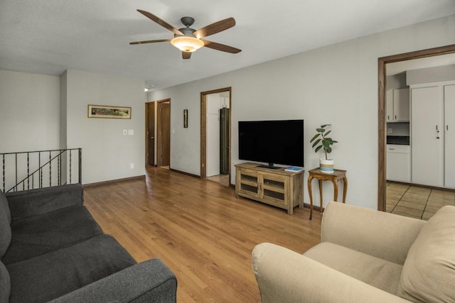 13056 Euclid Ave, Apple Valley, MN 55124 - living room with a ceiling fan and light wood-style floors
