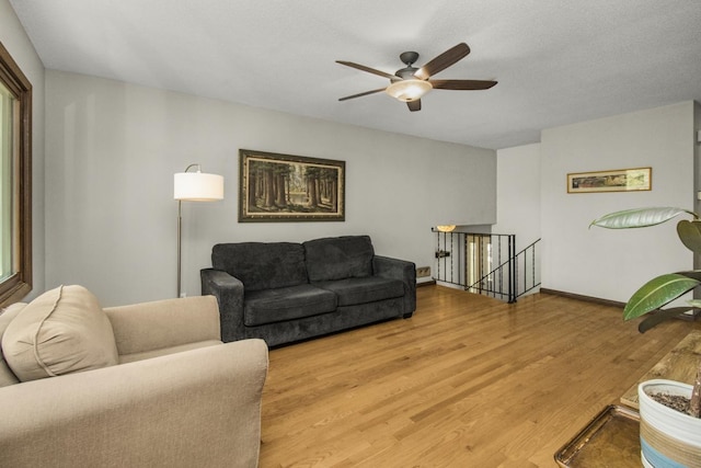13056 Euclid Ave, Apple Valley, MN 55124 - living room with ceiling fan and light wood-style flooring