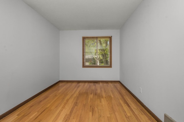 13056 Euclid Ave, Apple Valley, MN 55124 - unfurnished room with light wood-style flooring and baseboards