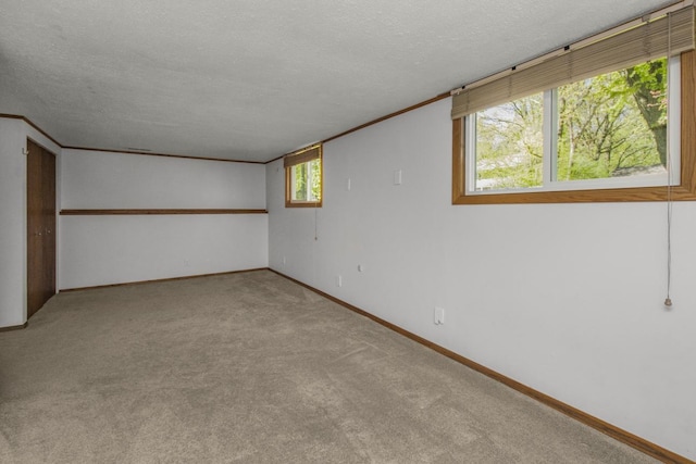 13056 Euclid Ave, Apple Valley, MN 55124 - carpeted spare room featuring a textured ceiling