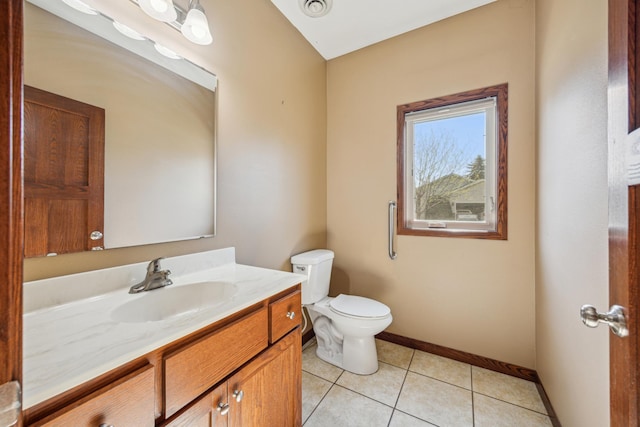 173 Cardinal Ln, Clearwater, MN 55320 - half bath with baseboards, toilet, tile patterned flooring, and vanity