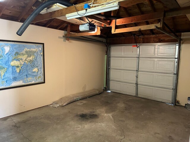 garage featuring a garage door opener
