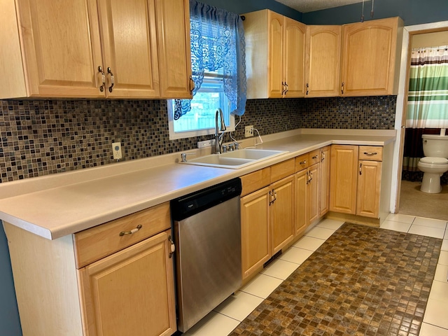 324 Maple Ave S, Thief River Falls, MN 56701 - kitchen featuring dishwasher, light brown cabinets, a sink, light tile patterned floors, and tasteful backsplash