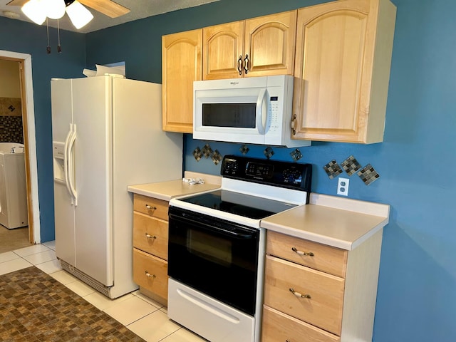 324 Maple Ave S, Thief River Falls, MN 56701 - kitchen with white appliances, light brown cabinets, washer / clothes dryer, a ceiling fan, and light tile patterned floors