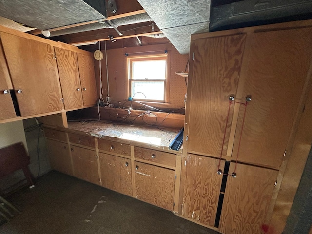 324 Maple Ave S, Thief River Falls, MN 56701 - kitchen featuring brown cabinets