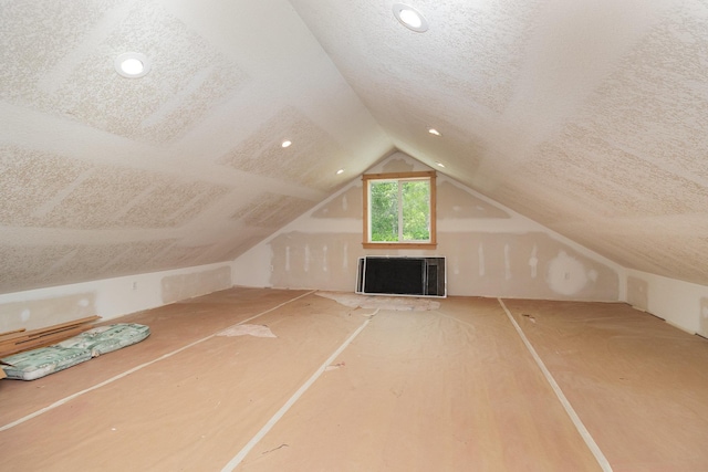 27667 Bay Shore Dr NW, Isanti, MN 55040 - bonus room featuring lofted ceiling and recessed lighting
