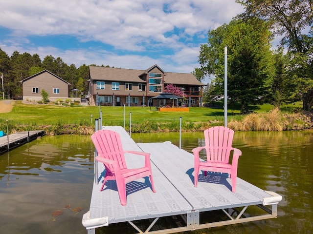 27667 Bay Shore Dr NW, Isanti, MN 55040 - dock area featuring a water view and a lawn