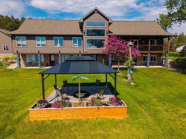 27667 Bay Shore Dr NW, Isanti, MN 55040 - view of green lawn with a gazebo and a patio area