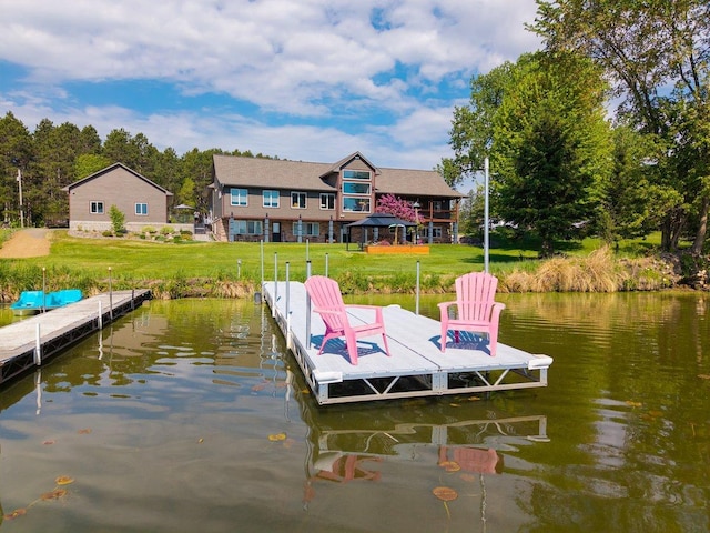 27667 Bay Shore Dr NW, Isanti, MN 55040 - dock featuring a water view and a lawn