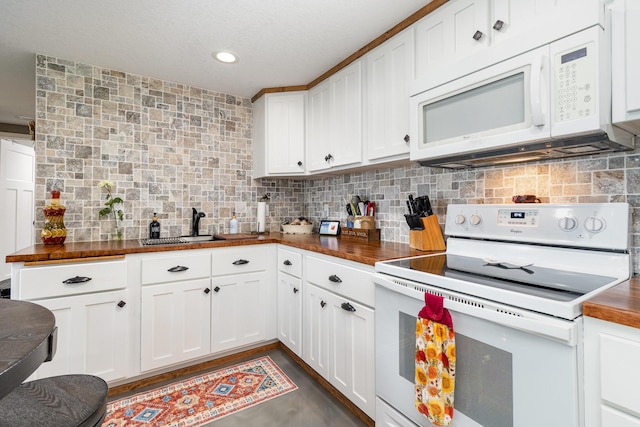 27667 Bay Shore Dr NW, Isanti, MN 55040 - kitchen featuring white appliances, butcher block counters, backsplash, white cabinets, and recessed lighting